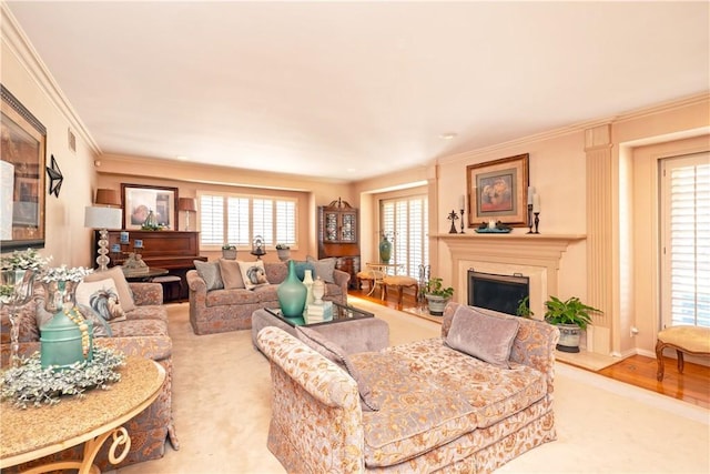 3152 Parkside Dr, San Bernardino, CA 92404 - living room with a fireplace, ornamental molding, and carpet floors