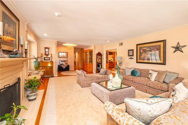3152 Parkside Dr, San Bernardino, CA 92404 - living area featuring ornamental molding, wood finished floors, a chandelier, recessed lighting, and a high end fireplace