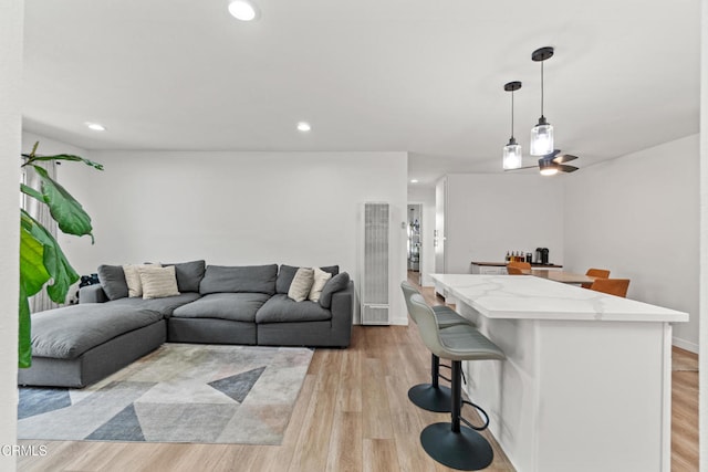 205 W Channel Islands Blvd, Port Hueneme, CA 93041 - living area featuring a heating unit, light wood-style floors, and recessed lighting