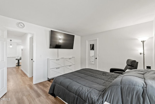 205 W Channel Islands Blvd, Port Hueneme, CA 93041 - bedroom featuring light wood-style flooring and baseboards