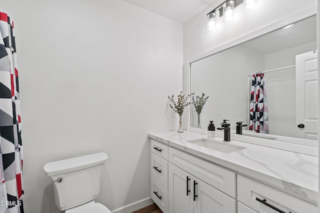 205 W Channel Islands Blvd, Port Hueneme, CA 93041 - full bath featuring vanity, toilet, a shower with curtain, baseboards, and wood finished floors