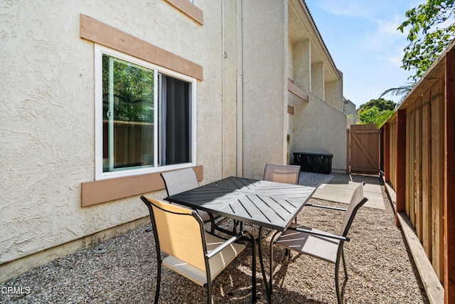 205 W Channel Islands Blvd, Port Hueneme, CA 93041 - view of patio / terrace with outdoor dining area and a gate