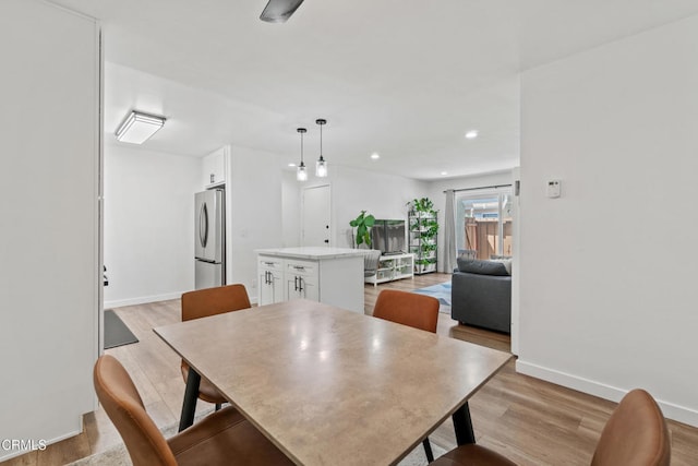 205 W Channel Islands Blvd, Port Hueneme, CA 93041 - dining area featuring light wood finished floors, baseboards, and recessed lighting