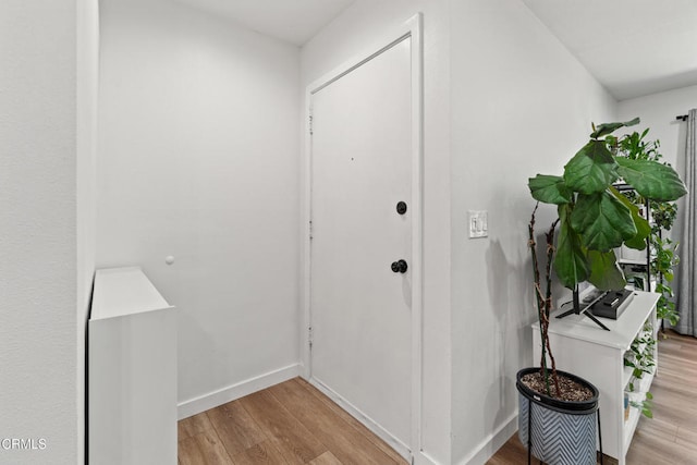 205 W Channel Islands Blvd, Port Hueneme, CA 93041 - hallway featuring light wood finished floors and baseboards