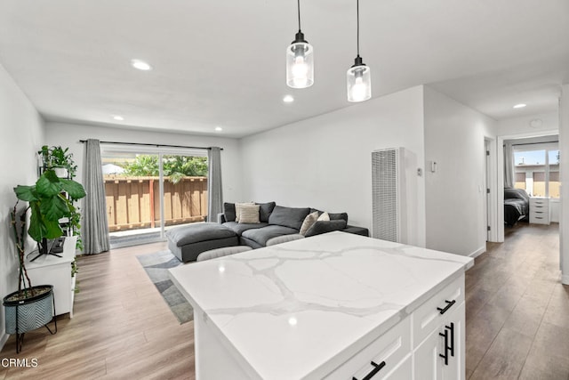 205 W Channel Islands Blvd, Port Hueneme, CA 93041 - kitchen with a heating unit, healthy amount of natural light, light wood finished floors, and recessed lighting