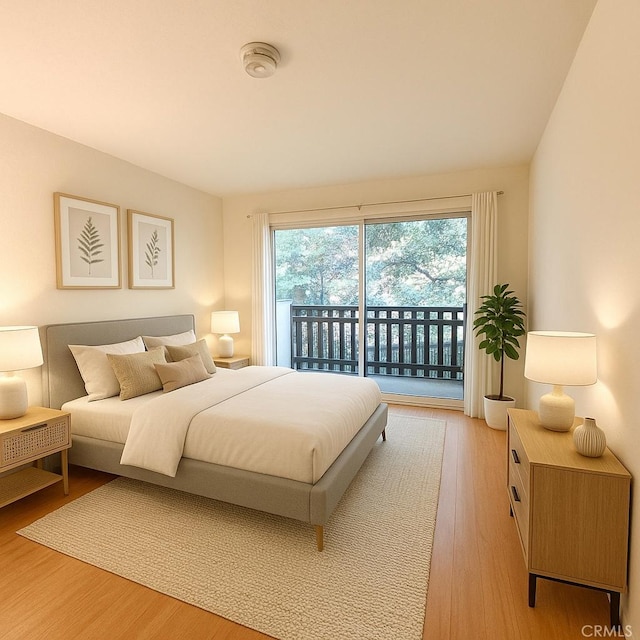 2 Panoramic Way Unit 302, Berkeley, CA 94704 - bedroom featuring access to outside and wood finished floors