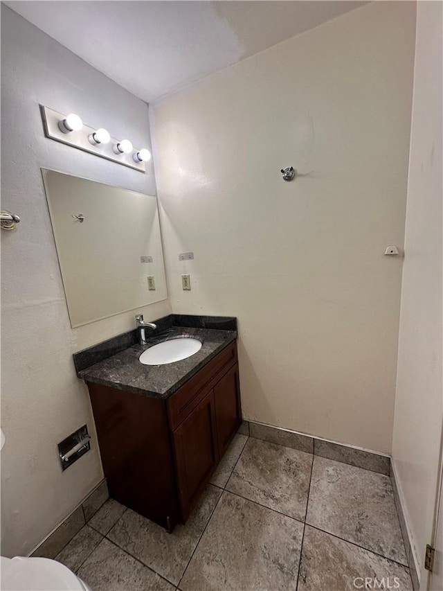 2 Panoramic Way Unit 302, Berkeley, CA 94704 - half bathroom with vanity, tile patterned floors, baseboards, and toilet