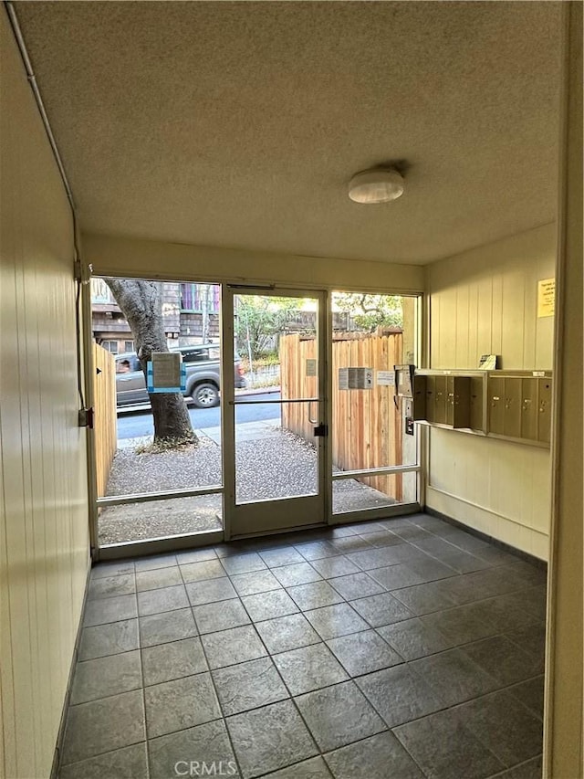 2 Panoramic Way Unit 302, Berkeley, CA 94704 - doorway to outside featuring a textured ceiling