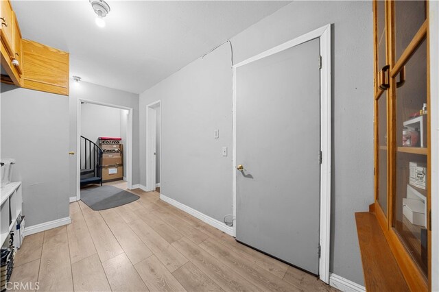 5223 Rosemead Blvd Unit F, San Gabriel, CA 91776 - corridor featuring stairway, light wood-style flooring, and baseboards