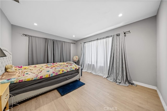 5223 Rosemead Blvd Unit F, San Gabriel, CA 91776 - bedroom featuring wood finished floors, baseboards, and recessed lighting