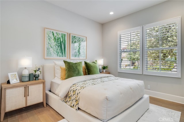 126 Paxton, Irvine, CA 92620 - bedroom with light wood-style flooring and recessed lighting