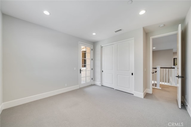 126 Paxton, Irvine, CA 92620 - unfurnished bedroom featuring carpet flooring, recessed lighting, and a closet