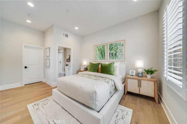 126 Paxton, Irvine, CA 92620 - bedroom featuring light wood finished floors, recessed lighting, and ensuite bath