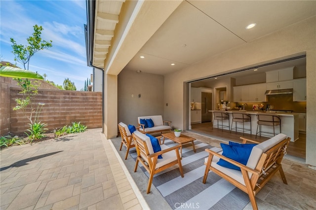 126 Paxton, Irvine, CA 92620 - view of patio / terrace featuring an outdoor living space and a sink