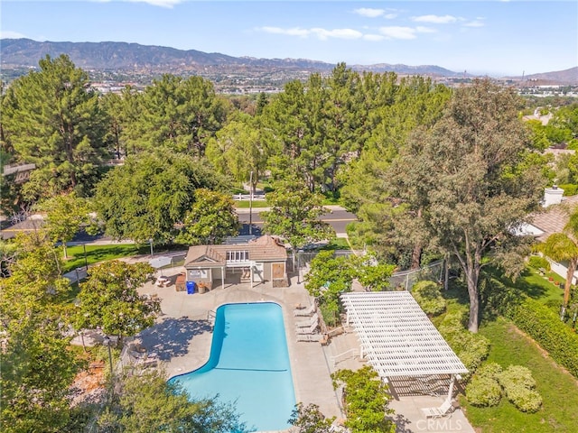 27054 Riversbridge Way, Valencia, CA 91354 - drone / aerial view of a mountain backdrop and a pool
