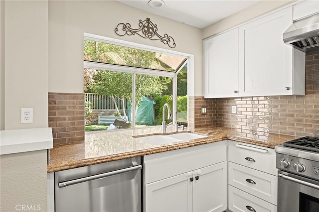 27054 Riversbridge Way, Valencia, CA 91354 - kitchen featuring stainless steel appliances, range hood, decorative backsplash, and white cabinetry