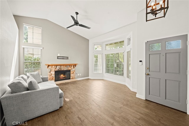 27054 Riversbridge Way, Valencia, CA 91354 - living area featuring high vaulted ceiling, ceiling fan, wood finished floors, and a fireplace