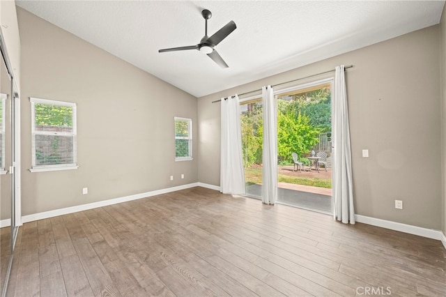 27054 Riversbridge Way, Valencia, CA 91354 - empty room featuring ceiling fan, wood finished floors, and vaulted ceiling
