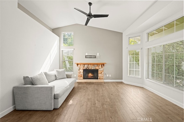 27054 Riversbridge Way, Valencia, CA 91354 - living room with ceiling fan, hardwood / wood-style flooring, a fireplace, and high vaulted ceiling