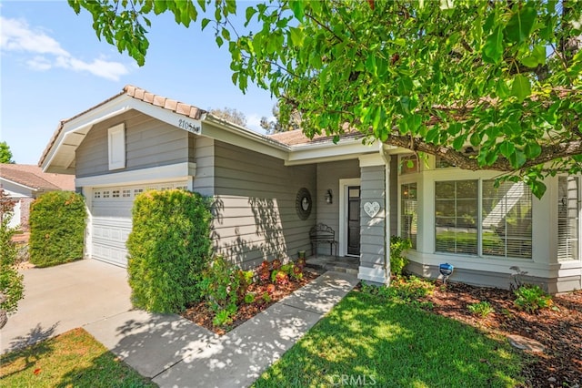 27054 Riversbridge Way, Valencia, CA 91354 - view of front of property featuring driveway and an attached garage