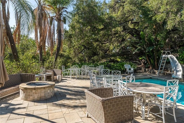 166 Opal Canyon Rd, Duarte, CA 91010 - view of patio featuring a fire pit, an outdoor pool, and outdoor dining space