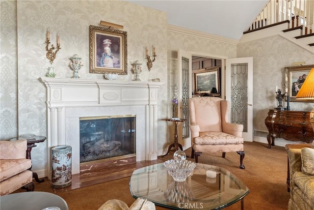 166 Opal Canyon Rd, Duarte, CA 91010 - living area featuring wallpapered walls, vaulted ceiling, carpet, a glass covered fireplace, and baseboards
