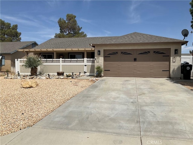 17911 Juniper St, Adelanto, CA 92301 - single story home with driveway, a garage, stucco siding, and a shingled roof