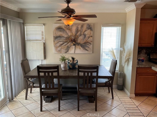 17911 Juniper St, Adelanto, CA 92301 - dining space with plenty of natural light, light tile patterned floors, ceiling fan, ornamental molding, and baseboards