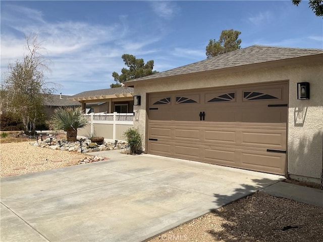 17911 Juniper St, Adelanto, CA 92301 - ranch-style home featuring stucco siding, an attached garage, driveway, and roof with shingles
