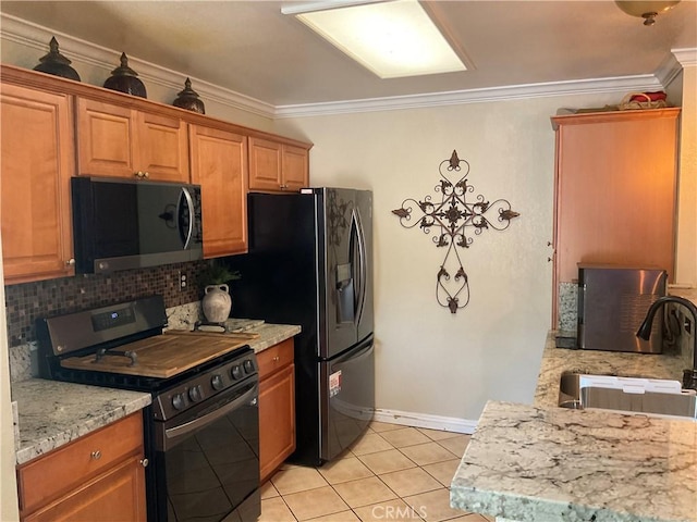 17911 Juniper St, Adelanto, CA 92301 - kitchen featuring gas range oven, a sink, decorative backsplash, light tile patterned flooring, and crown molding