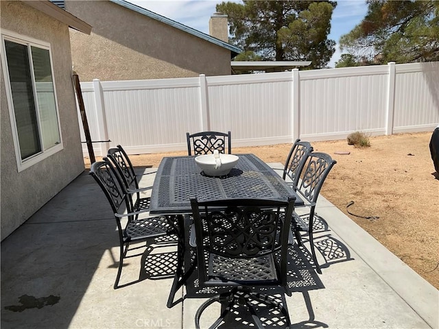17911 Juniper St, Adelanto, CA 92301 - fenced backyard featuring outdoor dining space and a patio area