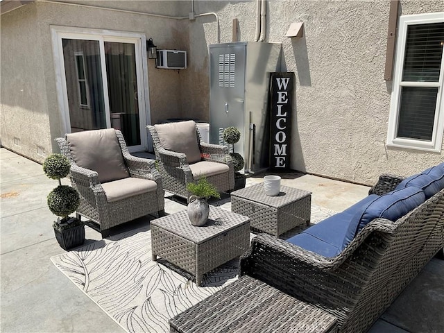 17911 Juniper St, Adelanto, CA 92301 - view of patio featuring outdoor lounge area and a wall unit AC