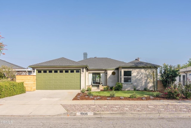 1906 S Meridian Ave, Alhambra, CA 91803 - view of front of house featuring a garage, driveway, and stucco siding