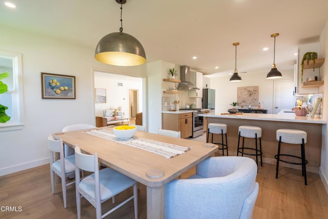 1906 S Meridian Ave, Alhambra, CA 91803 - dining area featuring light wood-style floors, recessed lighting, and baseboards
