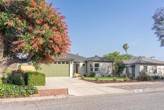 1906 S Meridian Ave, Alhambra, CA 91803 - ranch-style home with an attached garage, driveway, and stucco siding