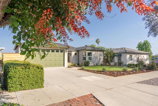 1906 S Meridian Ave, Alhambra, CA 91803 - ranch-style home featuring concrete driveway, stucco siding, an attached garage, and a front yard