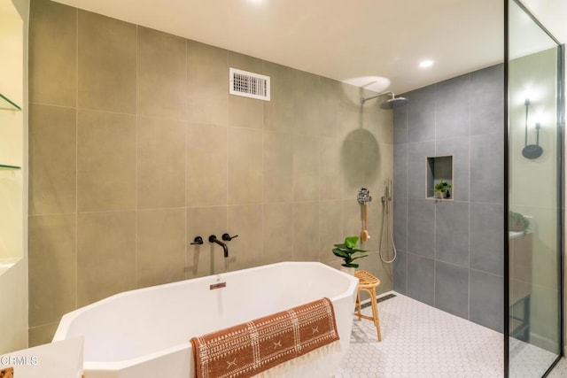 1906 S Meridian Ave, Alhambra, CA 91803 - bathroom with a walk in shower, tile walls, a soaking tub, tile patterned flooring, and recessed lighting