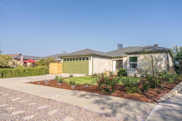 1906 S Meridian Ave, Alhambra, CA 91803 - view of front facade with concrete driveway, an attached garage, and stucco siding