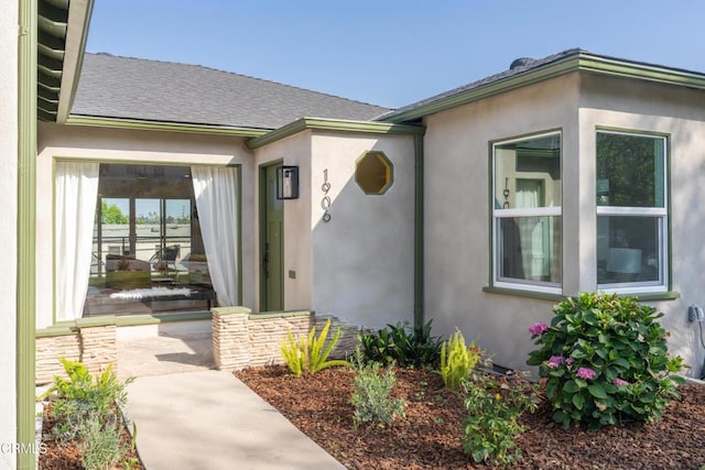 1906 S Meridian Ave, Alhambra, CA 91803 - property entrance featuring stucco siding and a shingled roof