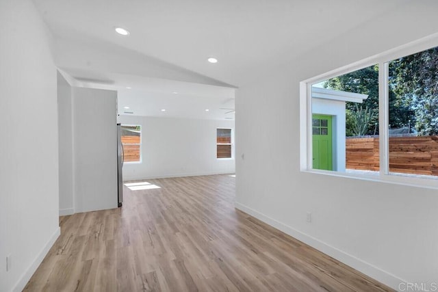 229 Yacon St, Vista, CA 92083 - unfurnished living room featuring light wood finished floors, baseboards, and recessed lighting