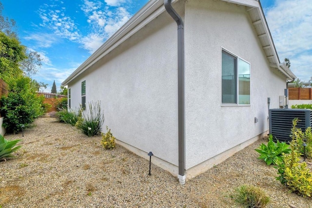 229 Yacon St, Vista, CA 92083 - view of property exterior with cooling unit and stucco siding