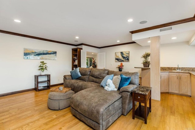 4400 Chaumont Rd, Woodland Hills, CA 91364 - living room with light wood-style flooring, recessed lighting, ornamental molding, baseboards, and wet bar