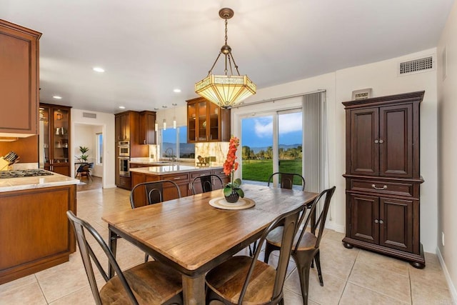 4400 Chaumont Rd, Woodland Hills, CA 91364 - dining room with light tile patterned floors, recessed lighting, and baseboards