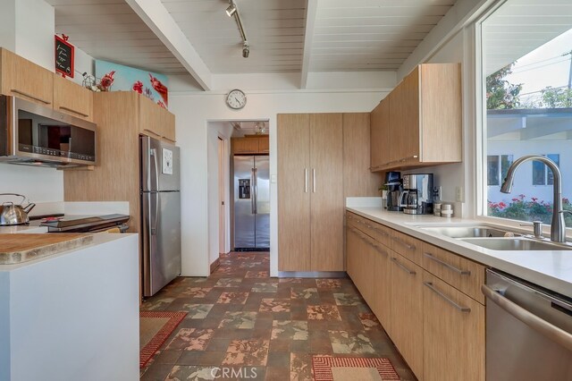 27649 Palos Verdes Dr E, Rancho Palos Verdes, CA 90275 - kitchen featuring stainless steel appliances, a sink, rail lighting, light countertops, and beam ceiling