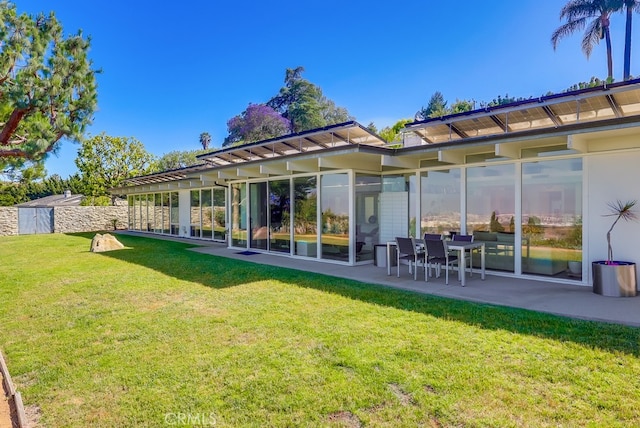 27649 Palos Verdes Dr E, Rancho Palos Verdes, CA 90275 - rear view of house with a patio and a lawn