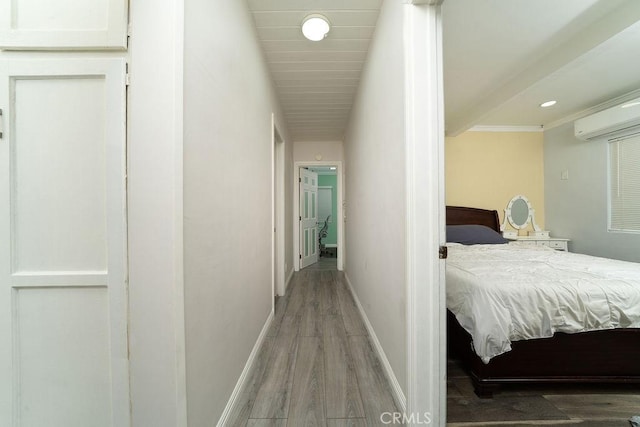 3603 W 144th Pl, Hawthorne, CA 90250 - hall with wood finished floors, baseboards, and a wall mounted AC