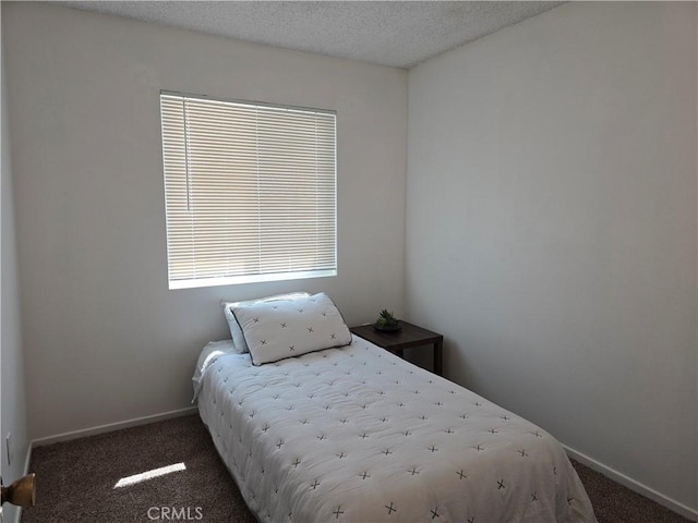 15043 S Culver Rd, Victorville, CA 92394 - carpeted bedroom featuring baseboards and a textured ceiling