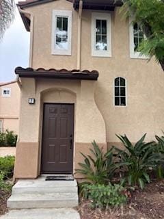 39244 Turtle Bay Ln Unit F, Murrieta, CA 92563 - view of exterior entry featuring stucco siding