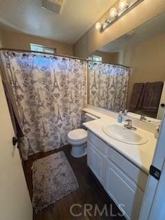 39244 Turtle Bay Ln Unit F, Murrieta, CA 92563 - full bath with vanity, toilet, wood finished floors, and a shower with curtain