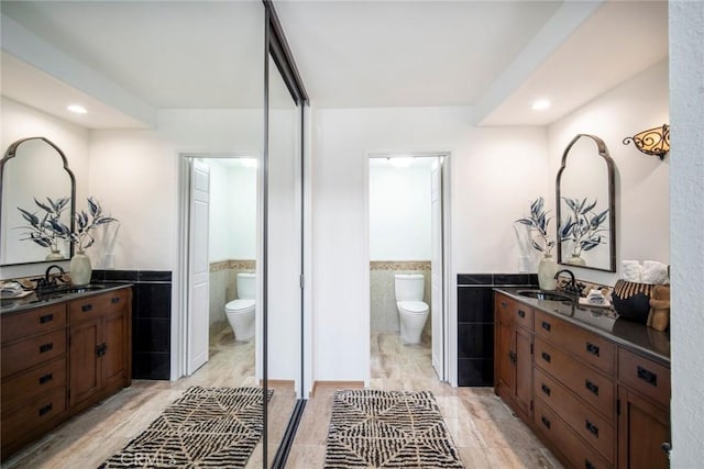 29111 Pompano Way, Laguna Niguel, CA 92677 - full bathroom with toilet, tile walls, vanity, a wainscoted wall, and recessed lighting